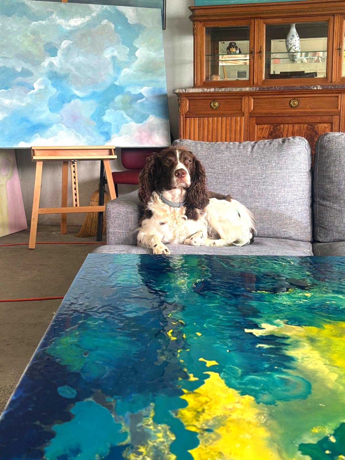 Isabelle Etienne's studio, with her dog and paintings